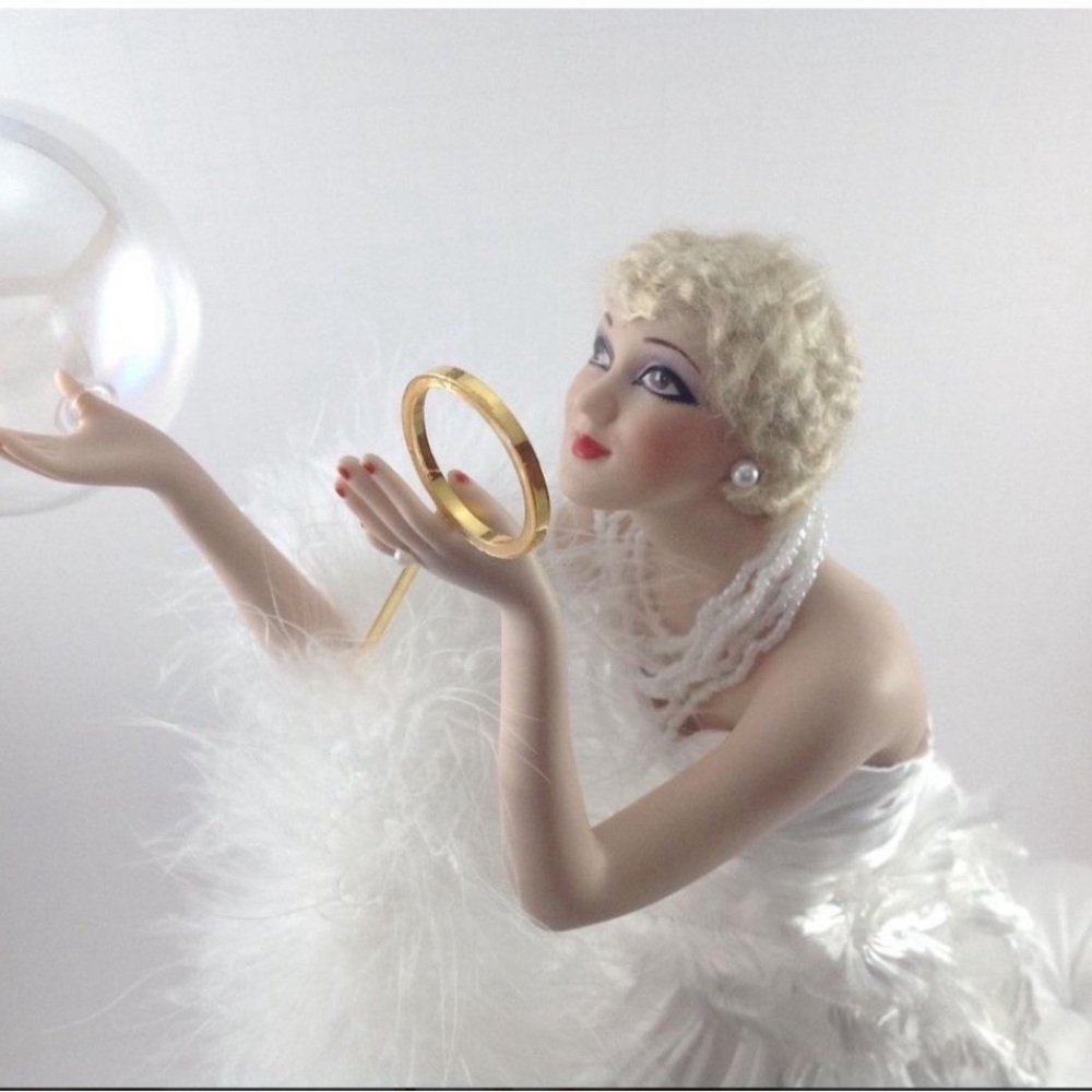 Elegant Porcelain Figurine with Gold Accents
